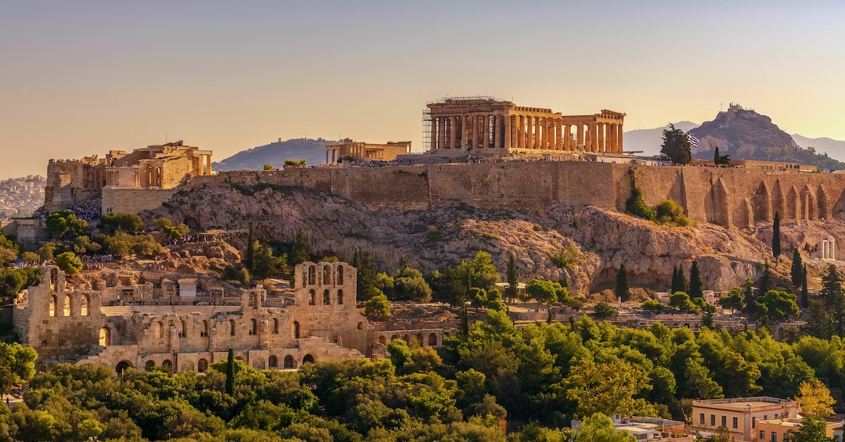 Hill of the Acropolis in the distance with the ruins of the Parthenon perched at the top