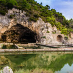Water leading into a cave in the Villa of Tiberius in Italy