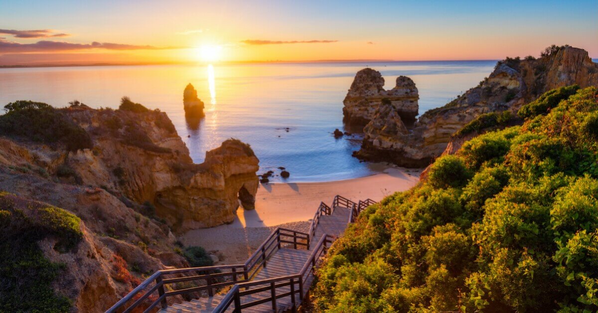 Sunrise on Portugal’s jagged Algarve coast, one of the most relaxing vacations throughout Europe