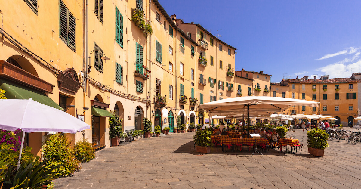 The famous yellow Piazza dell'Anfiteatro in Lucca, Italy