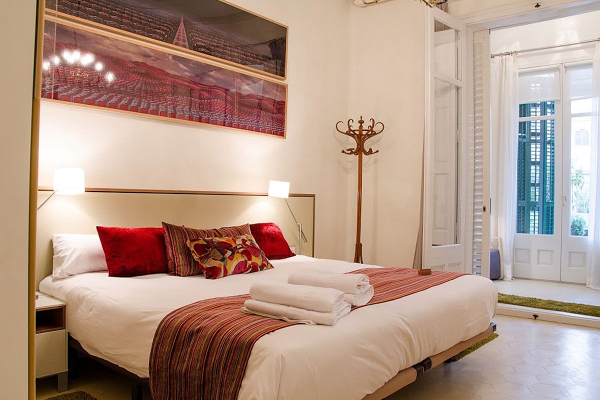 <b>Ca La Maria</b> - Featuring modern artwork, photographs and eclectic touches throughout, this boutique B&B is housed in an art-deco styled building that is only a 7-minute walk to Gaudi’s Casa Mila. The patio is full of leafy potted plants and has couches and umbrellas to relax under.
