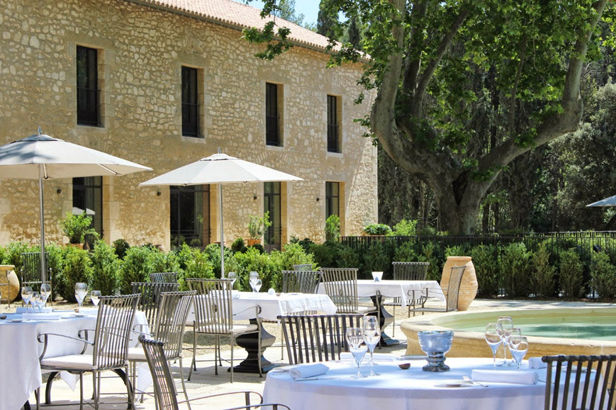 <b>Domaine de Manville, Les Beaux de Provence</b> - Wander around the stone fountain after enjoying a formal meal on the outdoor terrace, soak in the pool surrounded by lush shrubbery, or head to the eco-responsible golf course for a couple of rounds. The Domaine de Manville is a genteel hotel that offers guests a relaxing escape on its 100-acre estate.