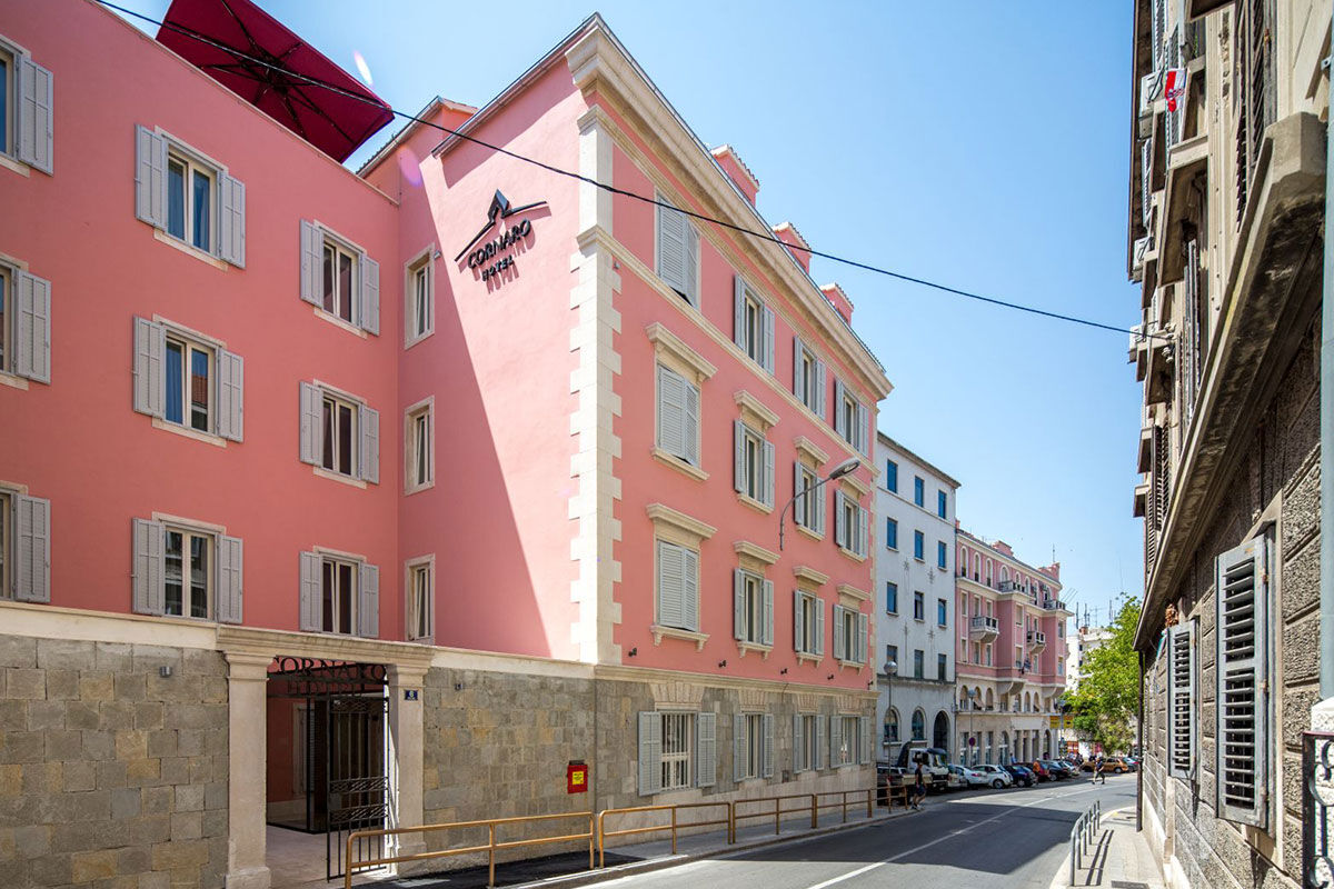 <b>Hotel Cornaro</b> - A pink palace with a rooftop terrace featuring some of the best views over Split’s Old Town, the Hotel Cornaro is both charming and polished. It features modern rooms with interesting artwork, indoor and outdoor dining, and is only a 3-minutes’ walk to UNESCO-protected Diocletian’s Palace.