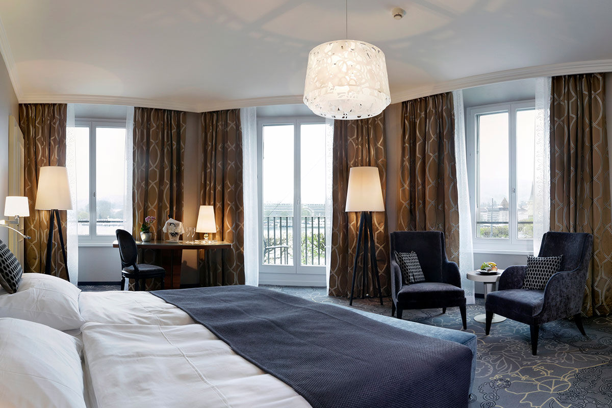 <b>Hotel Schweizerhof</b> - Built in 1845, this Rococo-styled hotel is nestled right in the Old Town and is a 5-minutes’ walk to the iconic Kapellbrucke covered bridge. The glass-enclosed restaurant, terrace and sleek bar are all open for investigating.