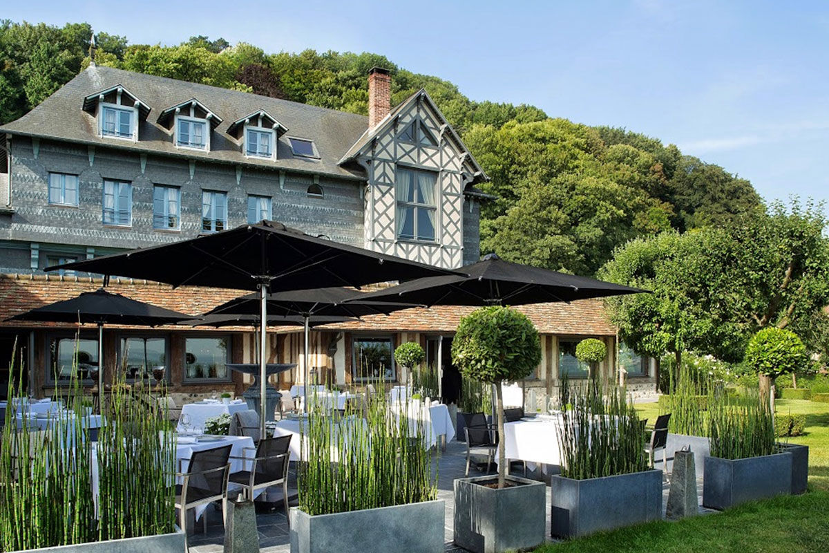 <b>Le Ferme Saint Simeon</b> - Less than a 10-minute walk to the Eugene Boudin Museum and the NaturoSpace botanical garden/butterfly sanctuary, this former Impressionist art colony is now home to a posh hotel that offers a variety of workshops. With antique furniture and a rustic bistro, cozy cocktail lounge and spa, guests mingle in comfortable luxury.