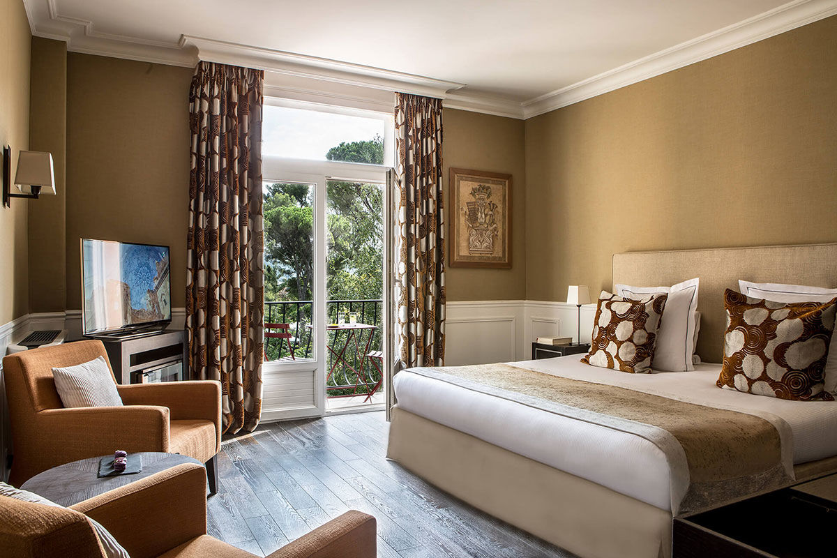 <b>Le Pigonnet, Aix en Provence</b> - Housed in an 18th century manor, this posh hotel is surrounded by landscaped gardens and terraces. Guests stay in sophisticated rooms, dine al fresco next to antique statues and grab a cocktail at the outdoor bar next to the pool.