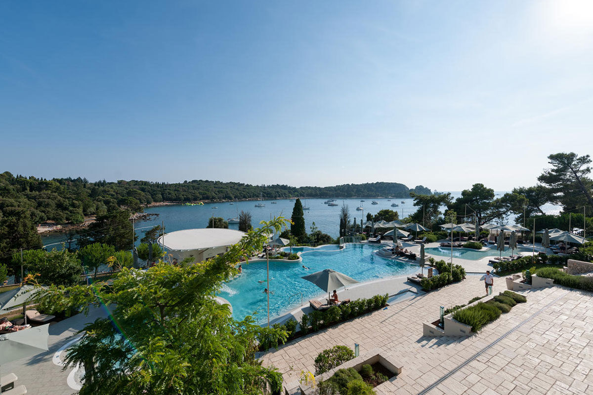 <b>Hotel Monte Mulini</b> - Set in a protected ancient forest overlooking the Adriatic Sea, the Hotel Monte Mulini is a luxury resort with only a 15-minutes’ walk into Rovinj’s city center. There’s a refined European restaurant, a glass-enclosed Mediterranean eatery, 4 outdoor pools, a bar with sea views and direct beach access for guests to take advantage of.