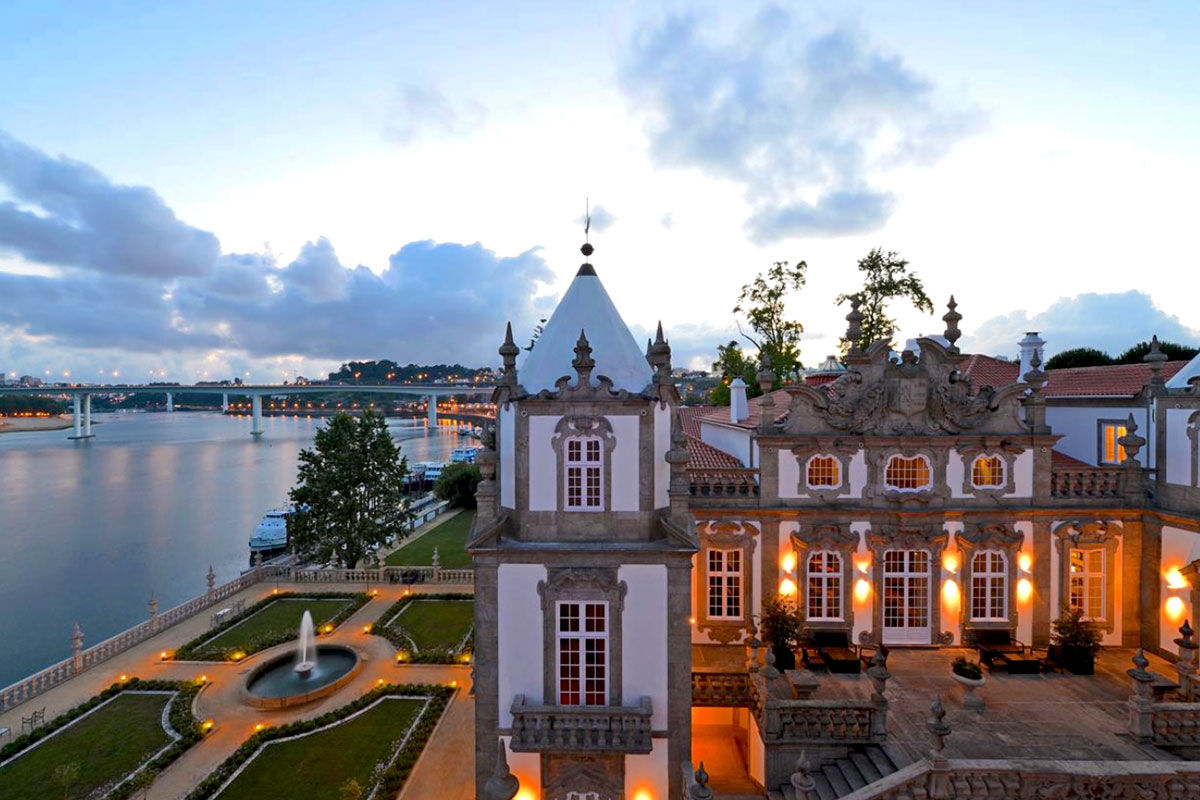 <b>Pestana Palácio do Freixo</b> - On the bank of the Douro River, guests wander through and around this 18th century palace to experience history and grandeur. Its lavish lounge, elegant rooms, and regional restaurant with frescos complete your refined holiday.