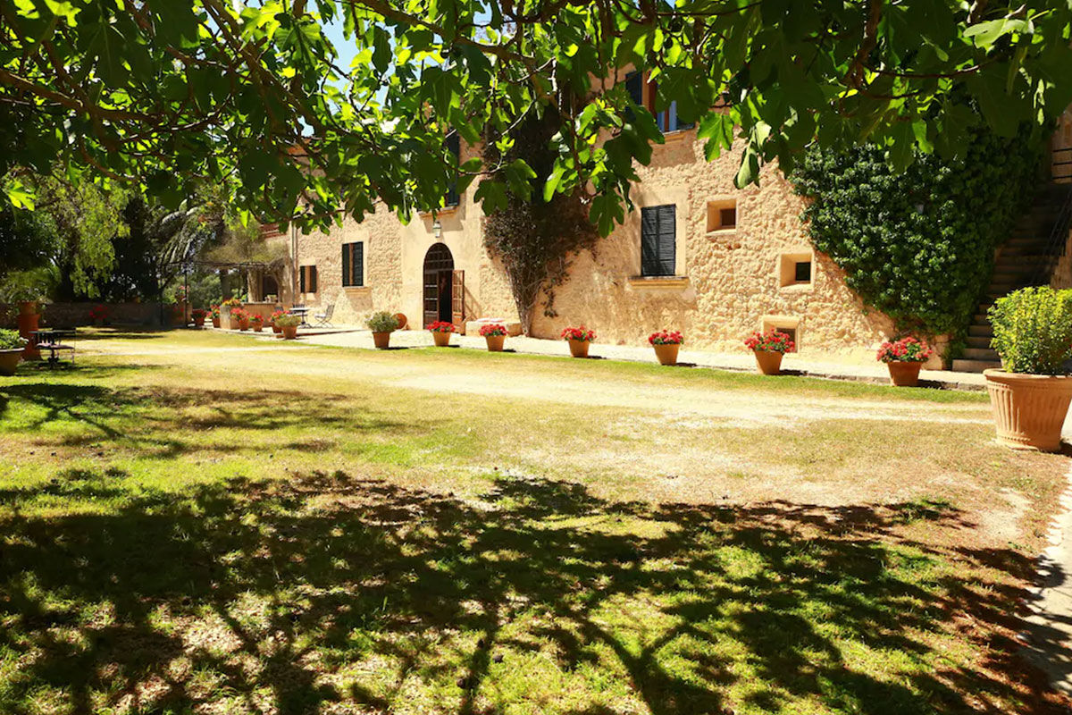 <b>Possessio Binicomprat, Mallorca</b> - Set within a 16th century farm building, this quaint hotel draws guests with its climbing vines, raw stonework, and exposed pine beams. The estate has its own vineyards, which produce 30,000 bottles of wine per year. Don’t forget to take one home with you!