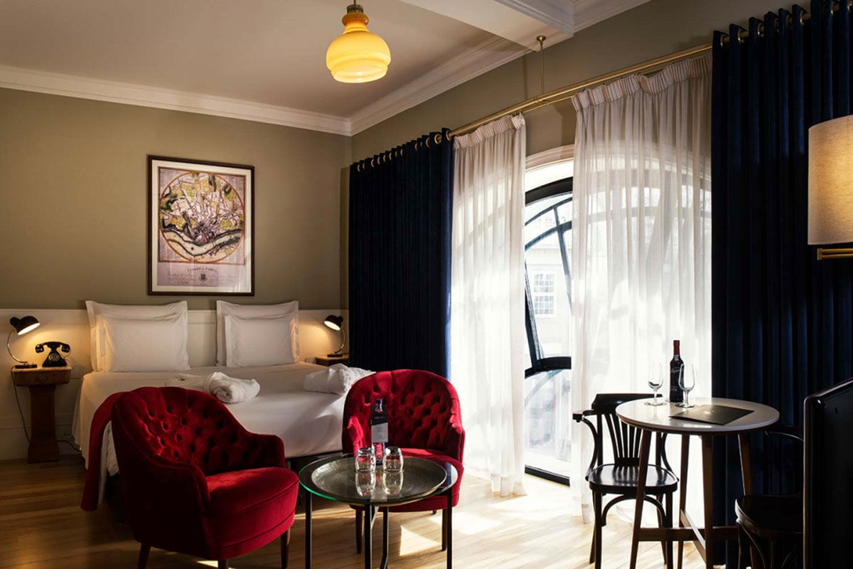 <b>Porto A.S. 1829 Hotel</b> - Just minutes from Sandeman Cellars and Palacio da Bolsa, the Porto A.S. 1829 Hotel was formerly one of Europe’s oldest stationary shops. Tucked away on a cobblestone street, the architecture is phenomenal, the décor is modern, and the understated style makes for a cozy and unique stay.