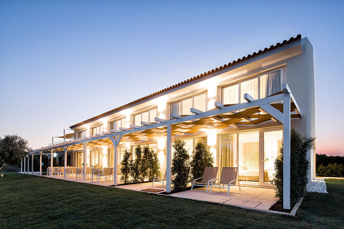 <b>Quinta dos Perfumes, Tavira</b> - Surrounded by an orange grove and full of other fruit trees, this perfume factory-turned-agritourism is quaint and romantic. The rooms are airy with a neutral palette, the pool is saltwater, and the lounge is cozy with a fireplace.