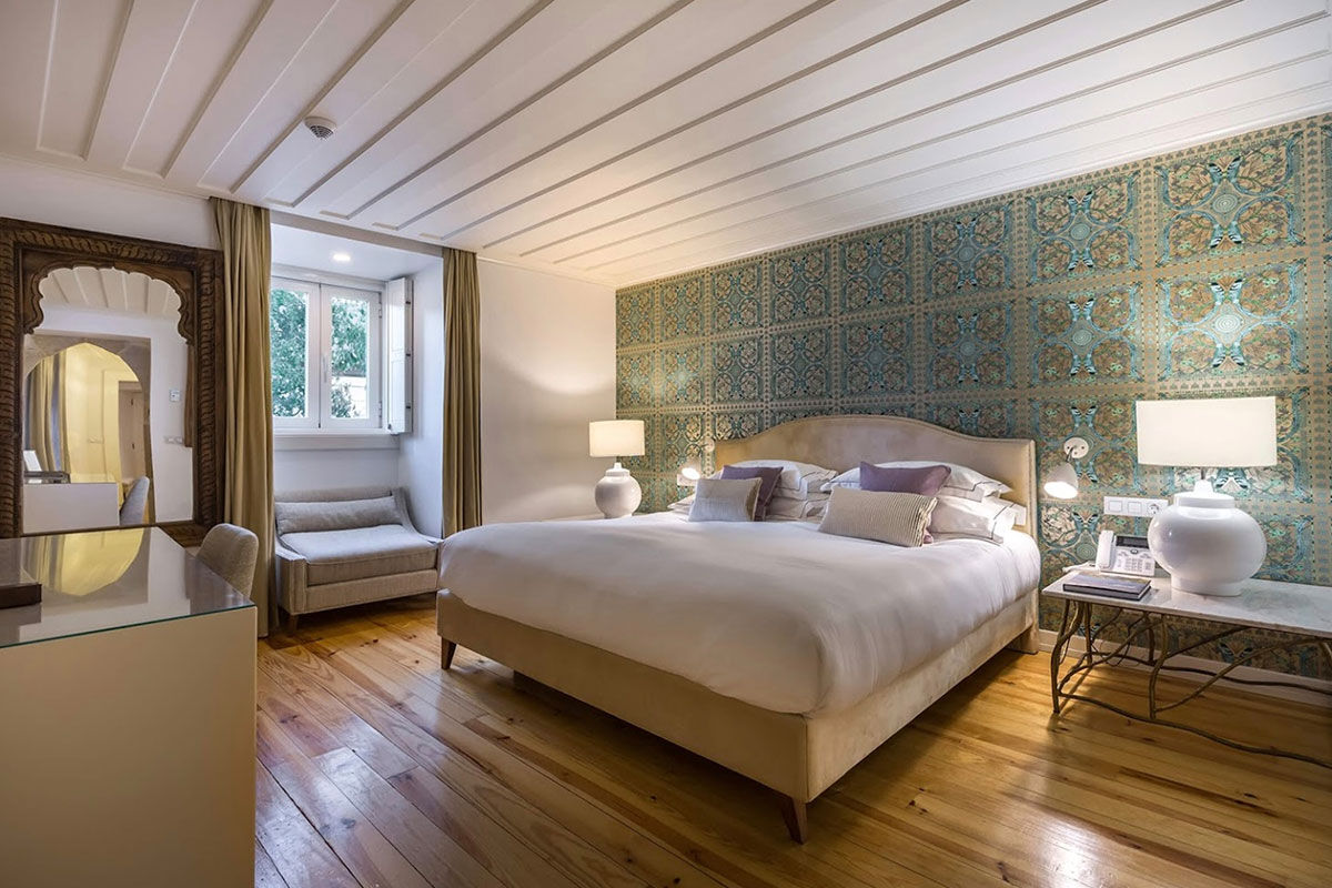 <b>Santiago de Alfama</b> - Within a former palace from the 15th century, this charming boutique hotel is a 9-minute’ walk to the Castelo de Sao and a 13-minute walk to the waterfront plaza Terreiro do Paco. The restaurant serves regional cuisine, the terrace is elegantly furnished, and the rooms have wood floors and paneled ceilings, giving it an overall classic feel.