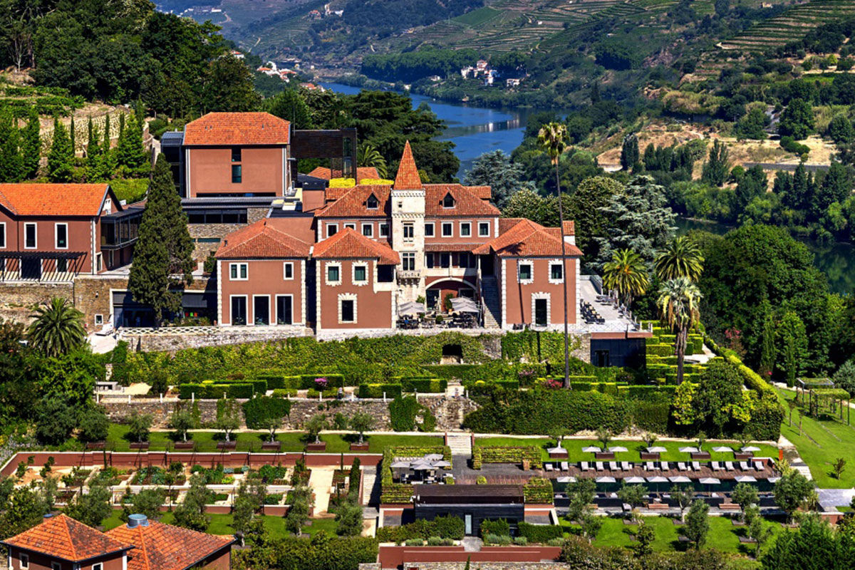 <b>Six Senses Douro Valley, Lamego</b> - Perched on a hilltop overlooking the Douro River, this 19th century manor-turned-sophisticated hotel offers wine, comfort and a little pizzazz. With an infinity pool, wine bar and cellar, trendy lounge and contemporary open-kitchen restaurant, guests’ senses are stimulated alongside authentic luxury.