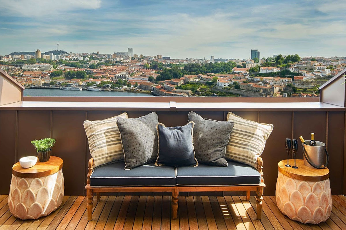 <b>Torel Avantgarde</b> - With views of the winding Douro River, the Torel Avantgarde is set in a 1940s building and comes with charm and class. This upscale hotel is sleek and moody: from the rooms to the restaurant, the pool to the artwork, the bar to the ‘Red Room.’