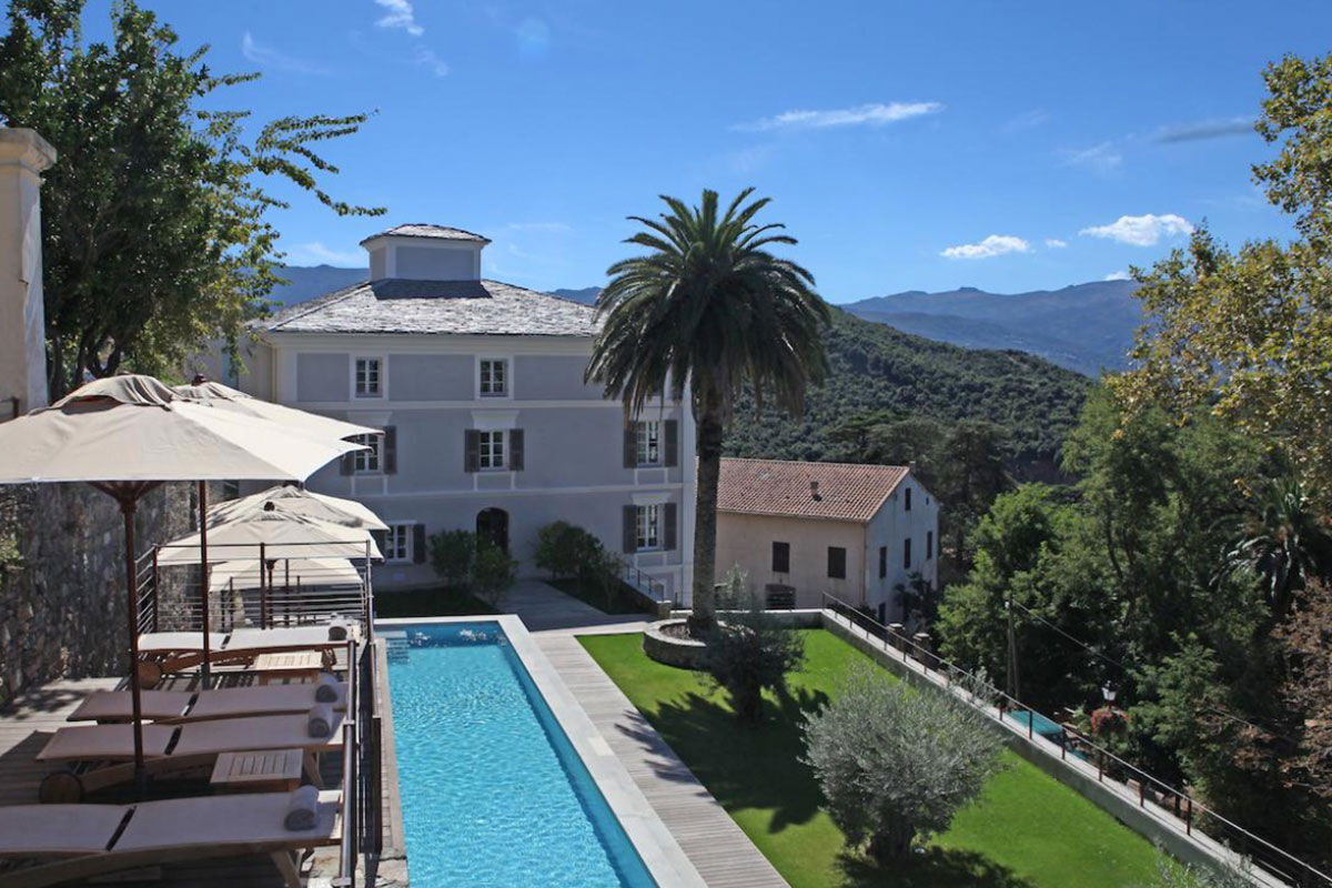 <b>U Palazzu Serenu Hotel, Oletta</b> - Featuring artworks and sculptures throughout the property, this 17th century Florentine-inspired villa is contemporary and sleek. With views of the mountains and sea from the pool, you’ll never want to leave its stone terrace.