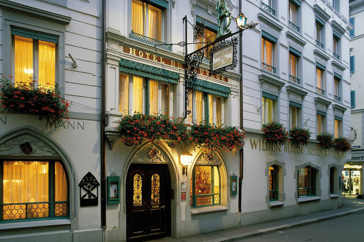 <b>Wilden Mann</b> - Welcome to the Old World as you step off the knobby cobblestone street and into this 19th century building-turned-boutique hotel. Inside you’ll find a cozy, rustic bistro with exposed wooden beams, an upscale French restaurant and country-chic rooms with antiques furnishings, giving the atmosphere a warm, charming feel.