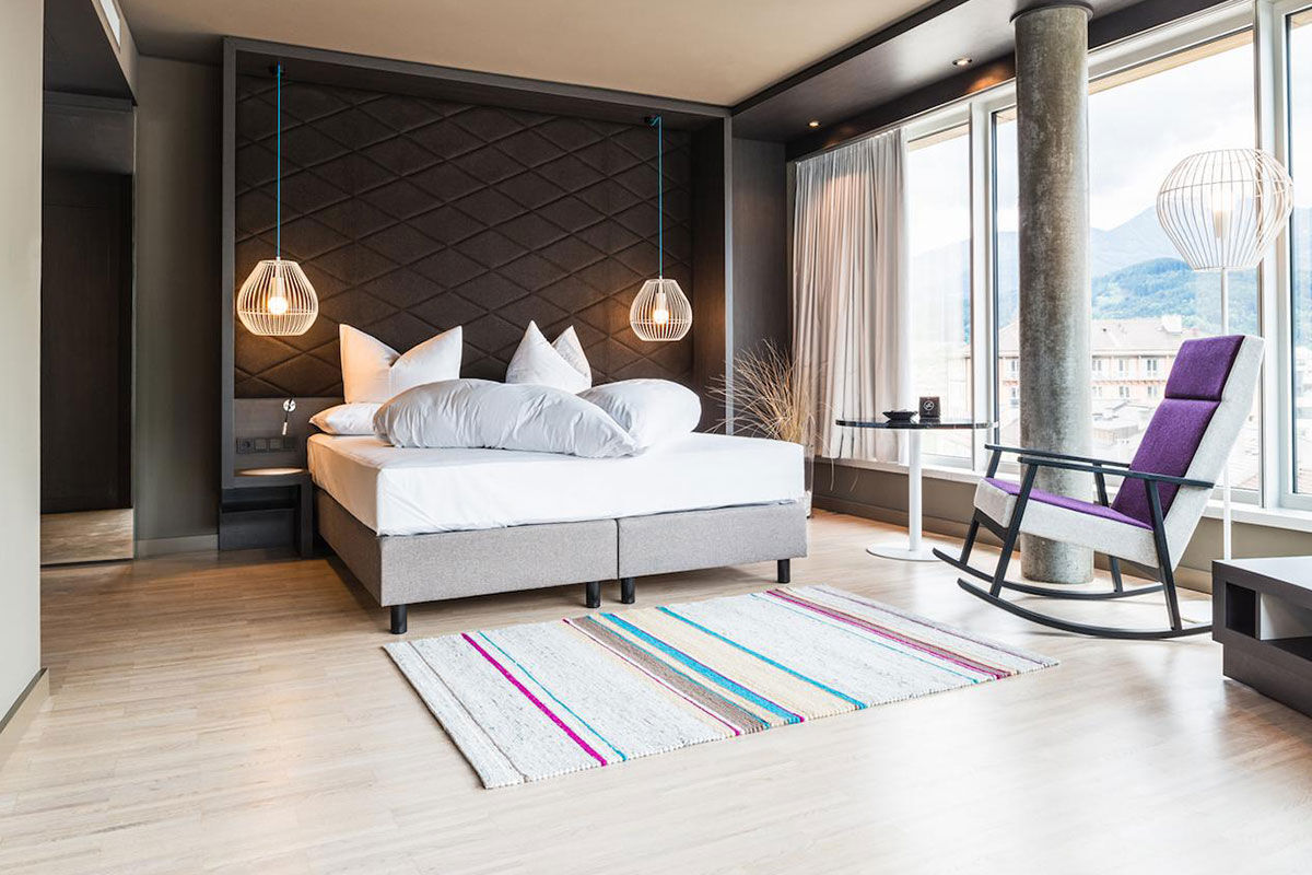 <b>Adlers Hotel Innsbruck</b> - Enjoy panoramic views of the city and Tyrolean Alps from this alpine-urban styled hotel in downtown Innsbruck. With newly designed rooms, a Turkish steam bath and sleek rooftop terrace, guests are rejuvenated to venture out and explore.