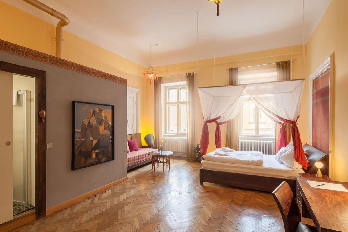 <b>Arte Vida Guesthouse</b> - Family-run and set in a historic townhouse from the 19th century, the Arte Vida Guesthouse is full of whimsy with a touch of the exotic—from Mediterranean flair to Asian ambience. Steps away from Mozart’s Residence, guests enjoy the outdoor garden courtyard, draping curtain ceilings and colorful lounge.