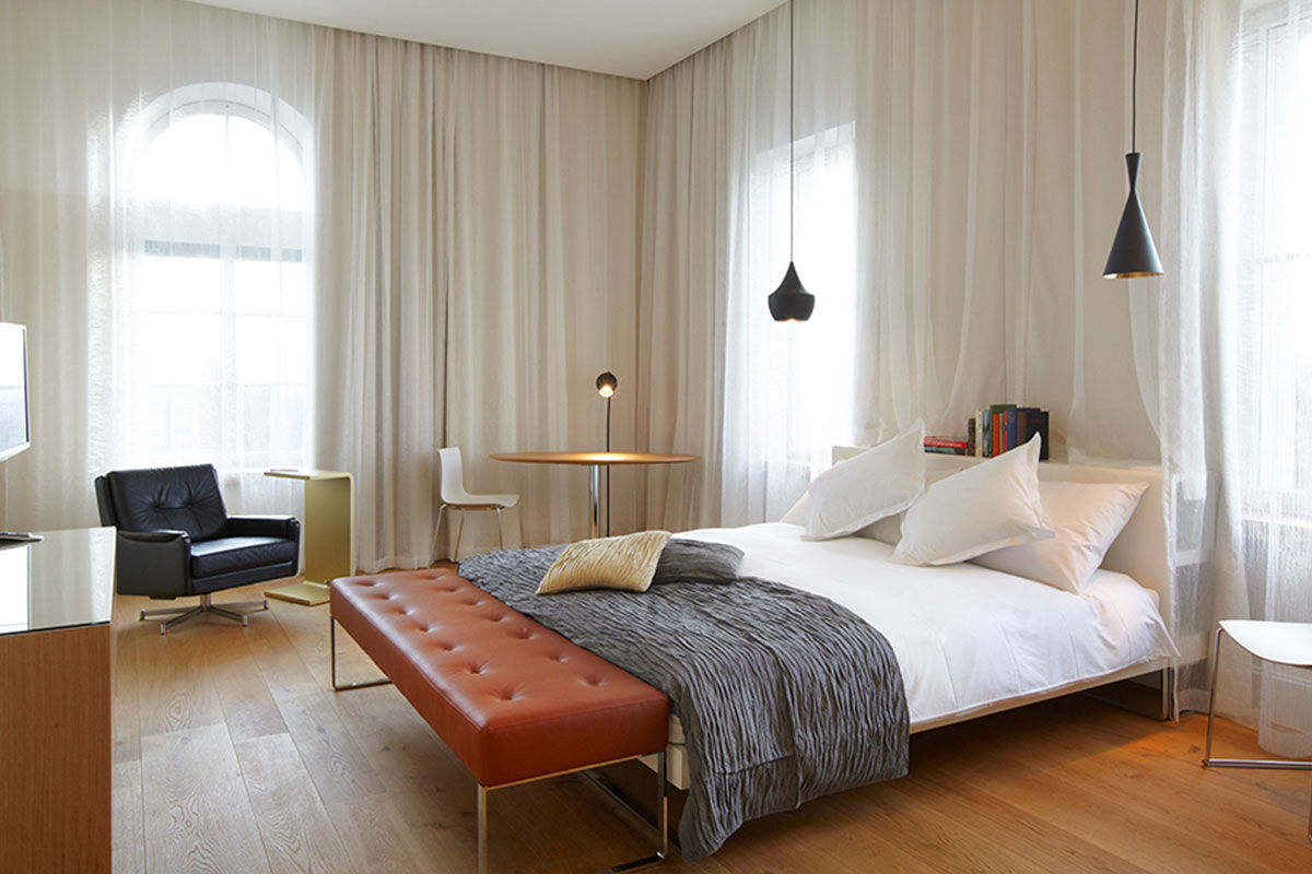 <b>B2 Boutique Hotel</b> - Housed in a 19th-century brewery, the B2 Boutique Hotel and Spa is as hip as they come: with contemporary architectural additions (such as a geometric rooftop pool), soaring floor-to-ceiling library in the lounge/bar (with over 33,000 books) and a wellness area with various pools and a steam bath. The hotel is close to the Kunsthaus Zurich museum as well as direct transportation.