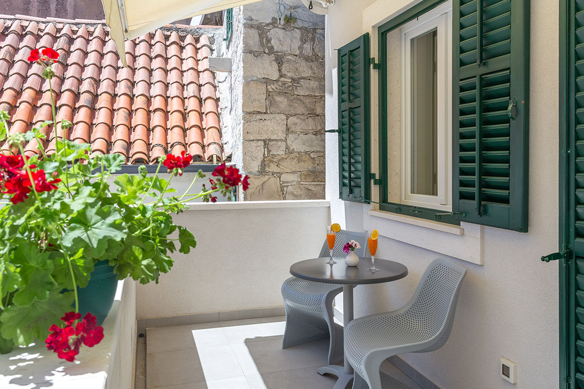 <b>Balatura Split Luxury Rooms</b> - Tucked in a quiet neighborhood by the port, this quaint B&B is relaxed and easygoing. The rooms are fresh-feeling and the patio is a perfect place to start your morning in peace.