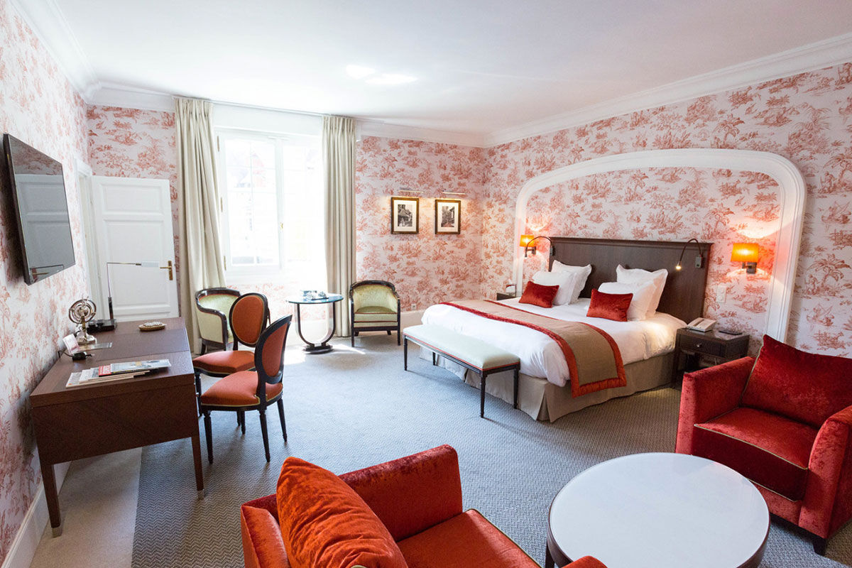 <b>Hotel Barrière Le Normandy</b> - With an air of Old-World elegance, this stately hotel is close to the Plage Deauville beach, Casino de Villers sur Mer and offers free loaner bikes for guests. Along with an indoor pool, tennis courts, and classically styled rooms, the Hotel Barriere Le Normandy also features a handsome bar with wood paneling and an elegant seafood restaurant with stained-glass windows.