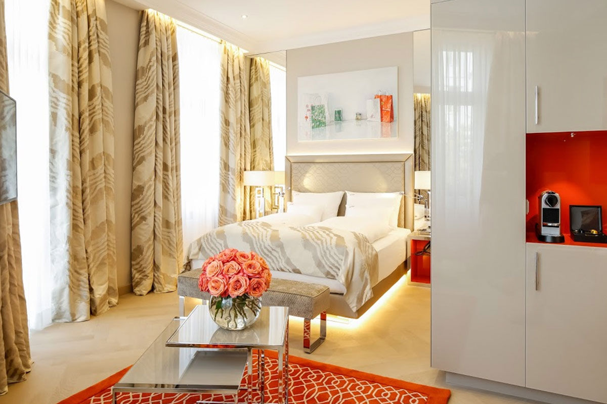 <b>Hotel Das Tyrol</b> - Shimmering gold and red velvet chairs reign at the Hotel Das Tyrol, along with original artworks by contemporary artists. This mod-chic hotel features a gold-tiled spa with a sauna and is a 13-minute stroll to the Hofburg Imperial Palace.