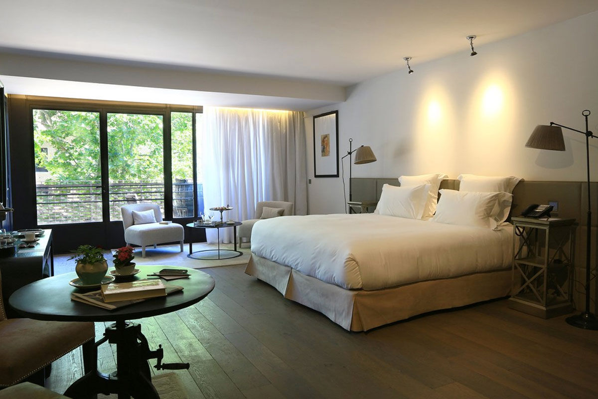 <b>Domaine de Manville, Les Beaux de Provence</b> - Wander around the stone fountain after enjoying a formal meal on the outdoor terrace, soak in the pool surrounded by lush shrubbery, or head to the eco-responsible golf course for a couple of rounds. The Domaine de Manville is a genteel hotel that offers guests a relaxing escape on its 100-acre estate.