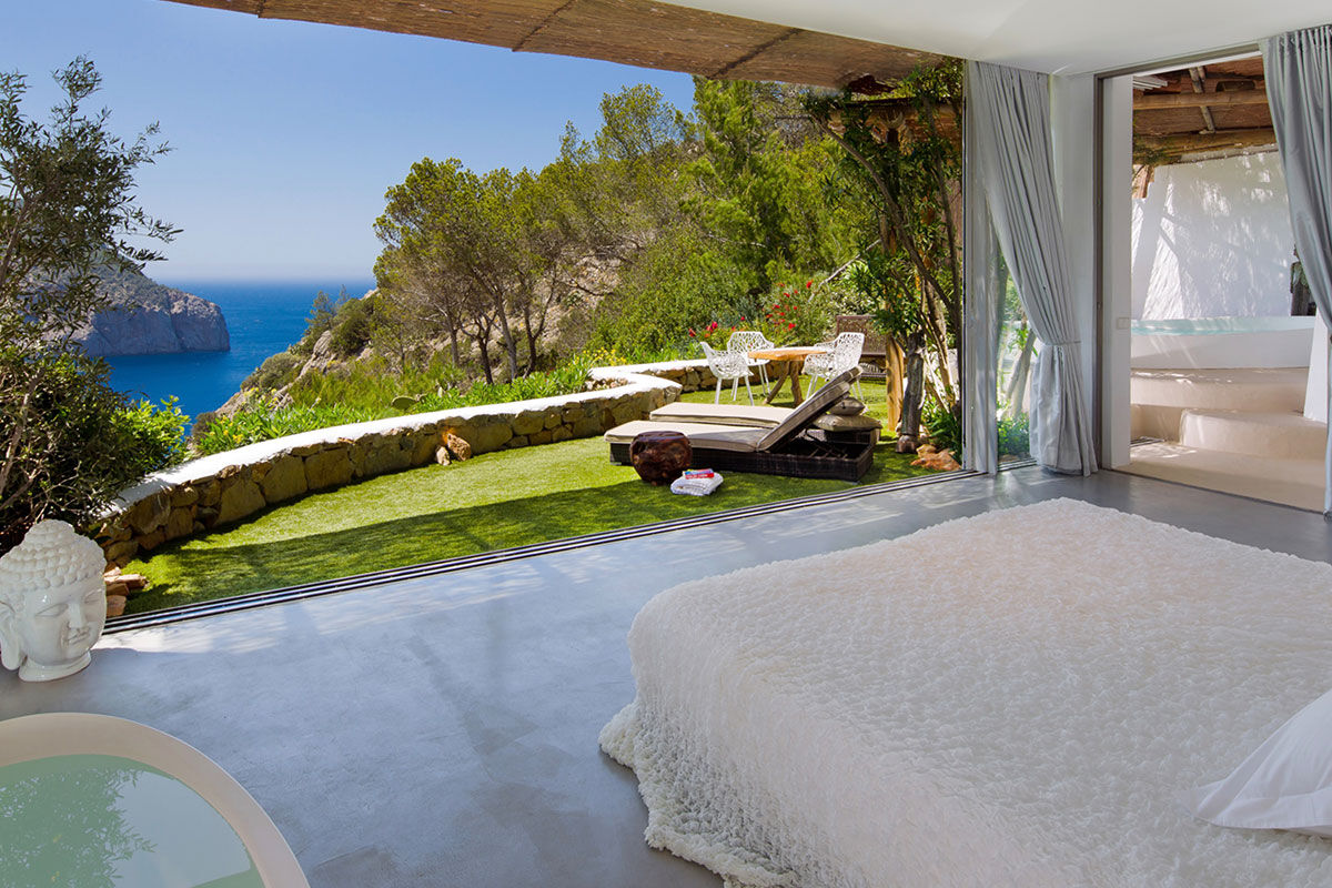 <b>Hacienda Na Xamena, Ibiza</b> - Removed from the clubbing areas of the island, Hacienda Na Xamena is an oasis to rejuvenate your body and overall well-being. The rooms are airy with incredible views, the restaurant and bar have lush plants throughout, and the combination of exposed wood and white-washed walls brings a feeling of freshness to your senses.