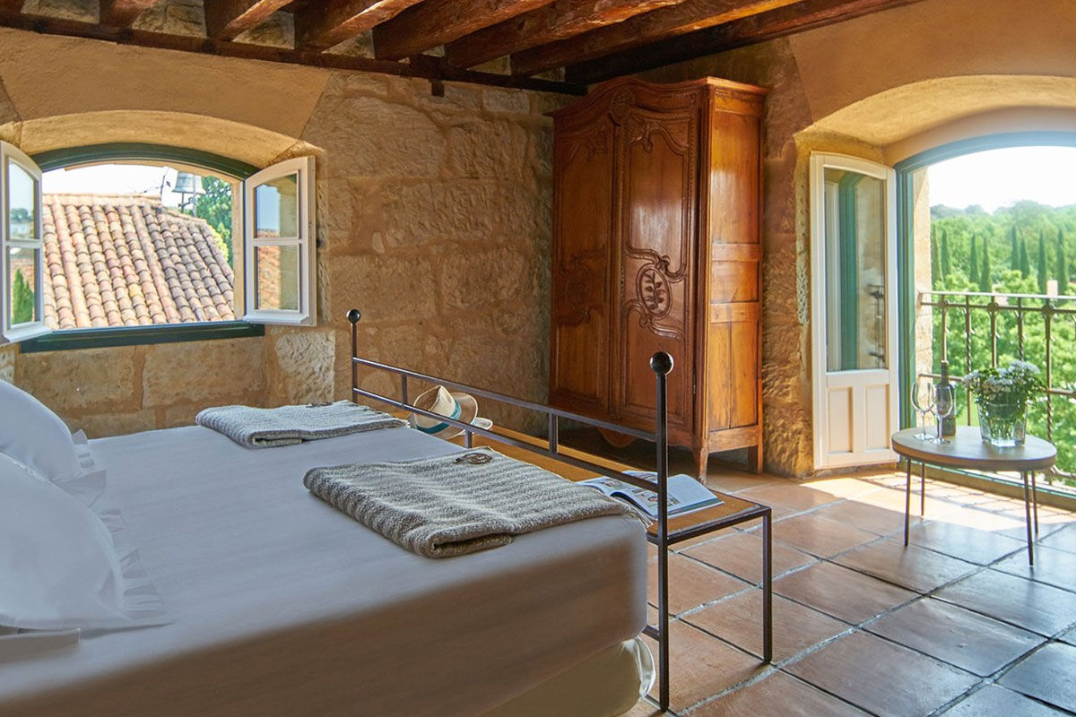 <b>Hacienda Zorita, Salamanca</b> - What once was an ancient Dominican monastery of the 14th century, Hacienda Zorita is a wine hotel and organic farm located on the River Tormes and is surrounded by countryside and vineyards. Taste the small batch wines, savor local cuisine, and admire the exposed wooden beams, stone walls, and almost-Tuscan finishes.