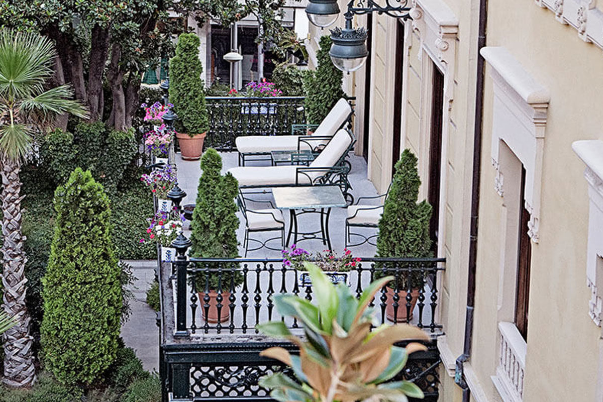 <b>Hospes Palacio de los Patos</b> - Traditional meets modern at the Hospes Palacio de los Patos. The hotel itself is housed in two buildings: one 19th century palace and one contemporary designer structure. With a sleek restaurant and terrace, guests are surprised and pleased to see original floor mosaics and ceiling murals throughout.