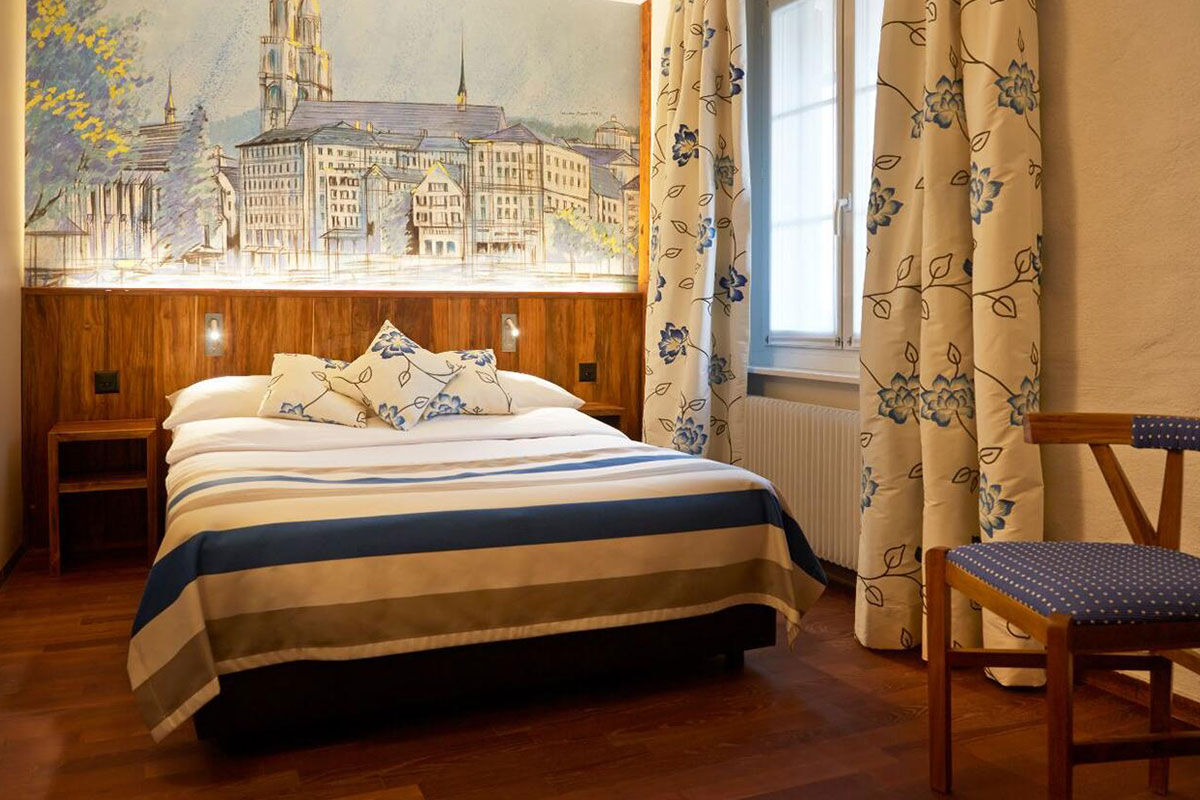 <b>Hotel Adler Zurich</b> - Only a 6-minute walk from the Grossmunster cathedral, this relaxed boutique hotel is centrally located and offers the comfort of home. With exposed beams, wood furnishings and cozy rooms, guests appreciate the inviting indoors as well as the outdoor terrace restaurant.