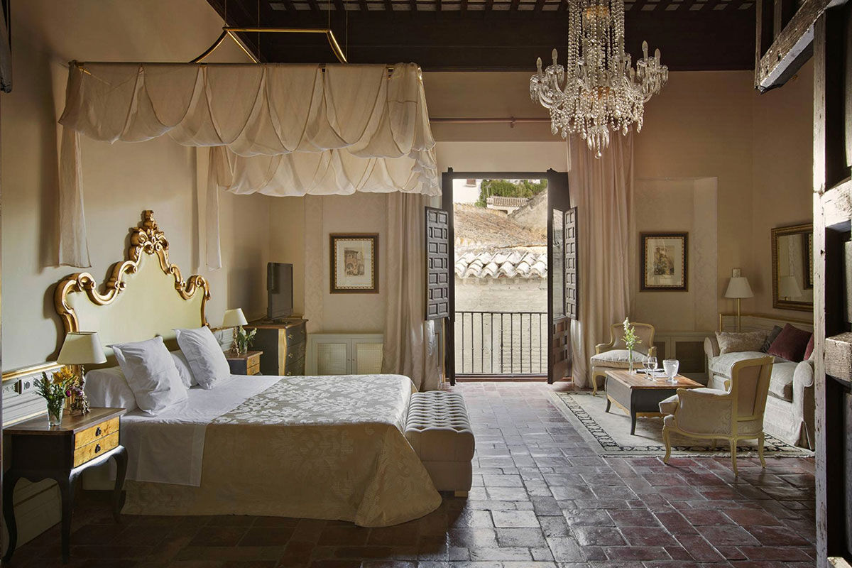 <b>Hotel Casa 1800 Granada</b> - A 6-minute walk to the Granada Cathedral, this upscale hotel is housed in a charming 16th century building with original wooden beams. Rooms are elegantly decorated, and the enclosed patio and lounge are comfortable places for guests to relax.