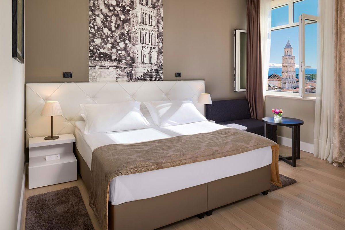 <b>Hotel Cornaro</b> - A pink palace with a rooftop terrace featuring some of the best views over Split’s Old Town, the Hotel Cornaro is both charming and polished. It features modern rooms with interesting artwork, indoor and outdoor dining, and is only a 3-minutes’ walk to UNESCO-protected Diocletian’s Palace.