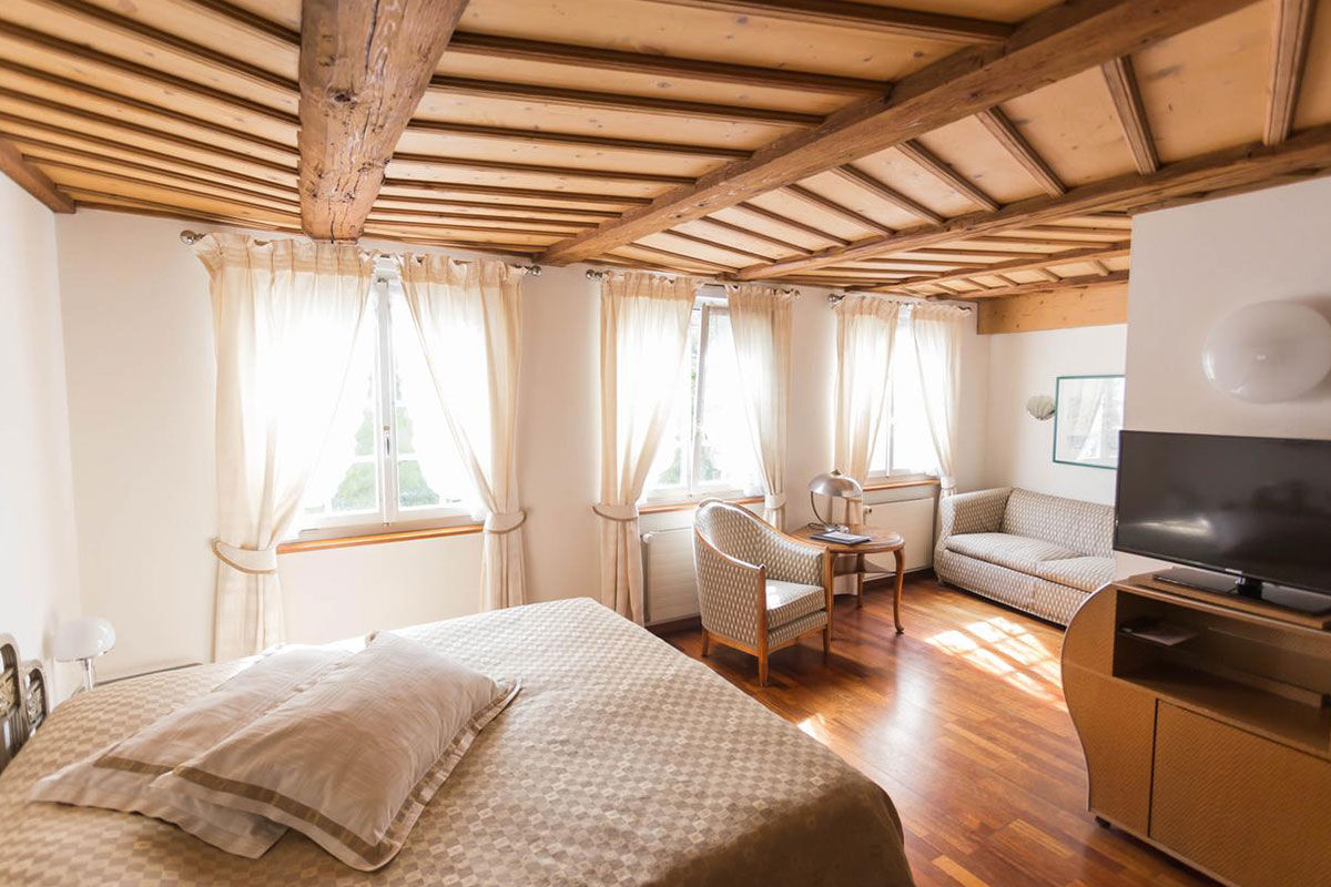 <b>Hotel Rebstock</b> - This picturesque boutique hotel sits in a historic half-timbered building with a turret and uses red-and-white stripes to draw guests’ eyes. Charming Hotel Rebstock sits at the foot of the Hofkirche Cathedral and offers 2 restaurants, a bar, seasonal terrace and informal rooms with artistic decoration.