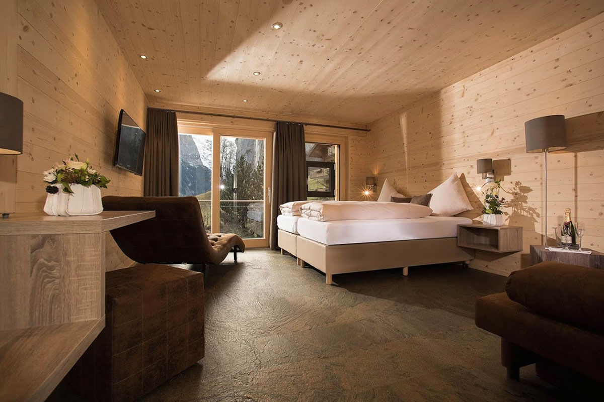 <b>Hotel Silberhorn, Lauterbrunnen</b> - With down-to-earth and classically modern rooms, the Hotel Silberhorn’s claim to fame is its incredible views from within the idyllic Lauterbrunnen valley. This wellness hotel offers a spa, Swiss ski school, unassuming restaurant with a fireplace, terrace and a sunroom.