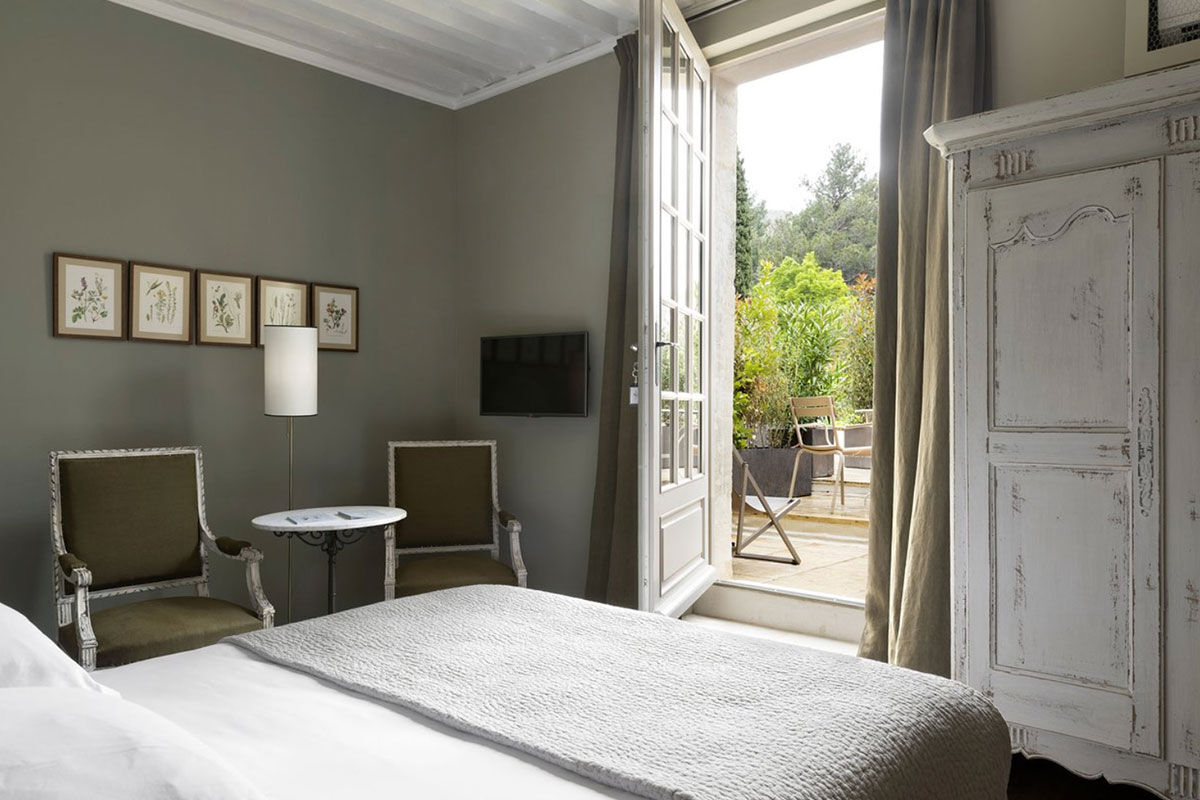 <b>Hotel Baumaniere, Les Baux de Provence</b> - With a 2-Michelin star restaurant, spa with hammam, tennis court, lounge-bar, pool and bike rental on site, the Baumaniere is full of activity. The rooms are modern, yet Provencal, the gardens and ponds are charming, and the boutique sells local products to savor.