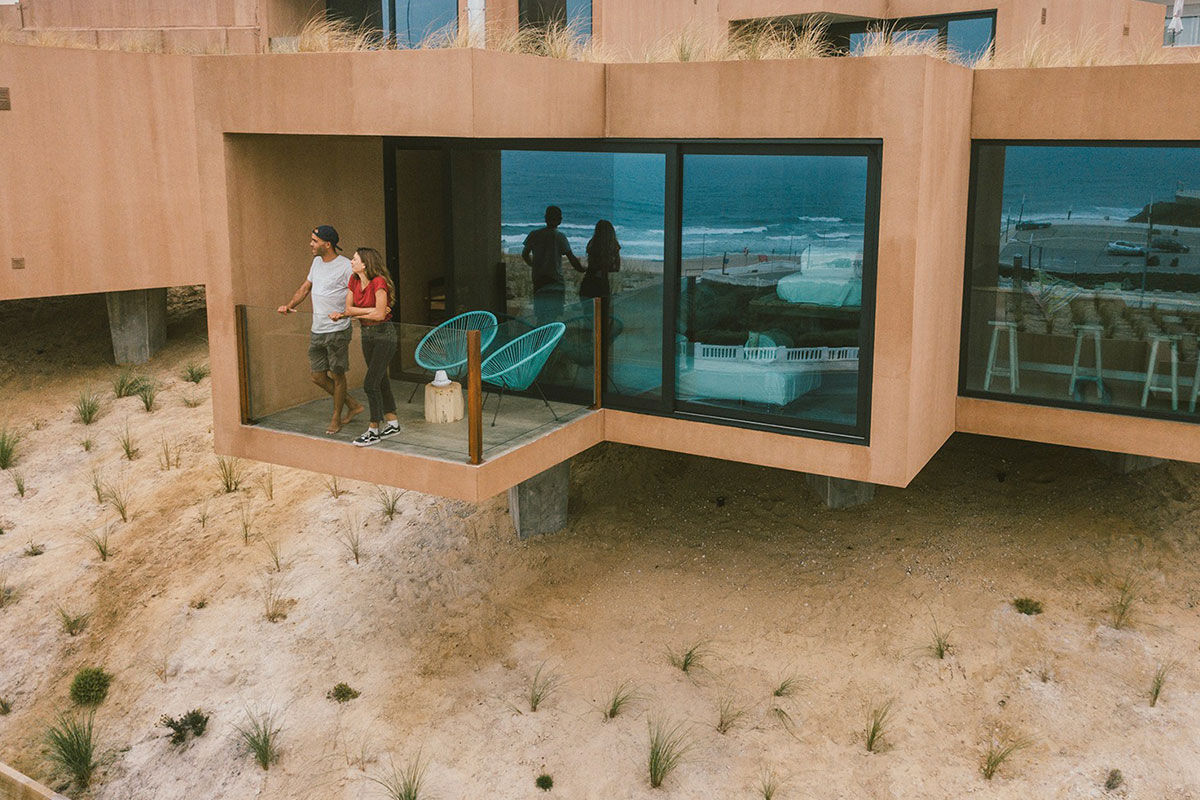 <b>Noah Surf House, A dos Cunhados</b> - Sitting on Praia da Fisica in Santa Cruz, this industrial-chic hotel lives in respect and consonance with nature. With its focus on the Atlantic Ocean, the Noah Surf House is a gathering place for travelers who love to surf, skateboard, adventure and appreciate a crackling fire with friends.