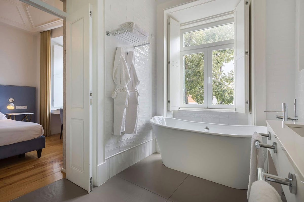 <b>Santiago de Alfama</b> - Within a former palace from the 15th century, this charming boutique hotel is a 9-minute’ walk to the Castelo de Sao and a 13-minute walk to the waterfront plaza Terreiro do Paco. The restaurant serves regional cuisine, the terrace is elegantly furnished, and the rooms have wood floors and paneled ceilings, giving it an overall classic feel.