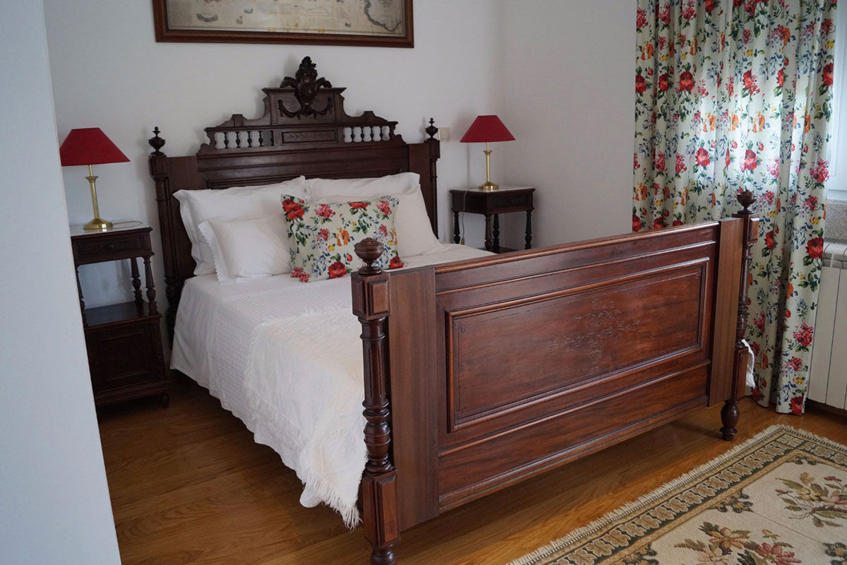 <b>Casa de Sao Domingos, Peso da Regua</b> - This quaint B&B gets its charm from the plants growing in terracotta pots, its stone wall next to the pool, and the sun loungers with parasols. The views of the Duoro River with hills in the background makes for a perfect backdrop for your relaxing vacation.