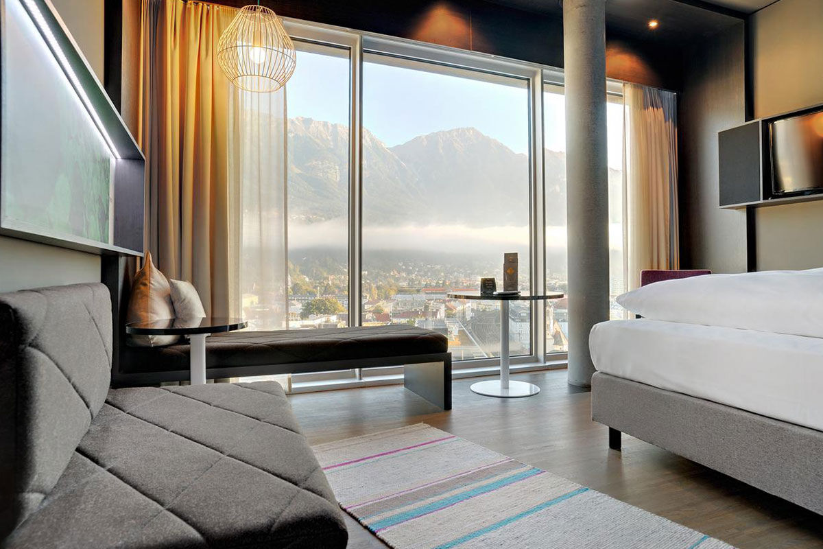 <b>Adlers Hotel Innsbruck</b> - Enjoy panoramic views of the city and Tyrolean Alps from this alpine-urban styled hotel in downtown Innsbruck. With newly designed rooms, a Turkish steam bath and sleek rooftop terrace, guests are rejuvenated to venture out and explore.