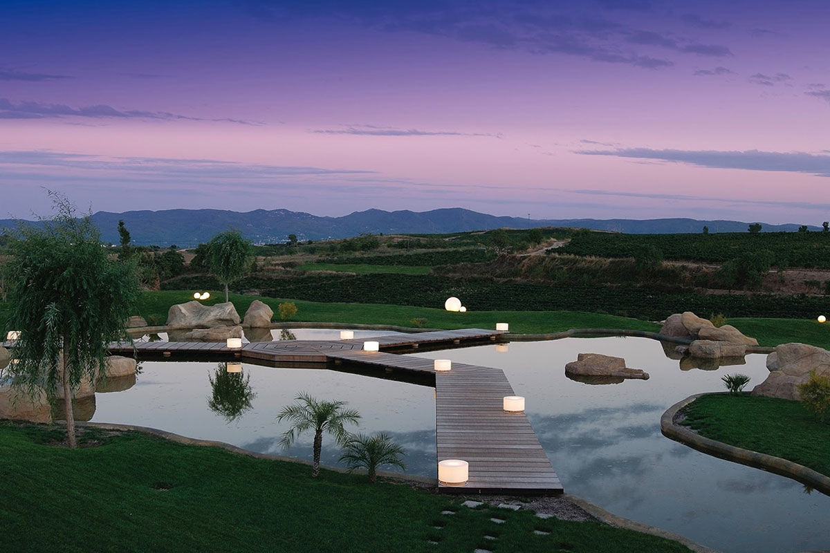 <b>Can Bonastre Wine Resort, Masquefa</b> - Boasting over 460 years of wine history and set in a 16th century farmhouse, the Can Bonastre Wine Resort sits below the Monteserrat mountain range and is surrounded by vineyards. Wander from your polished room, head past the chic spa and sauna, meander through the landscaped gardens, and arrive just in time for your wine tasting tour.