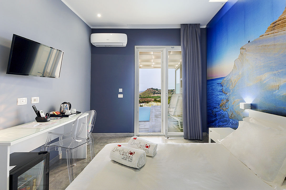 <b>Doric Bed Boutique Hotel, Agrigento</b> - Overlooking the Valley of the Temples and the Mediterranean Sea, the Doric Bed Boutique Hotel is set in a modern complex with colorful details. The picturesque infinity pool, terraces and garden full of aromatic herbs make for a relaxing getaway.