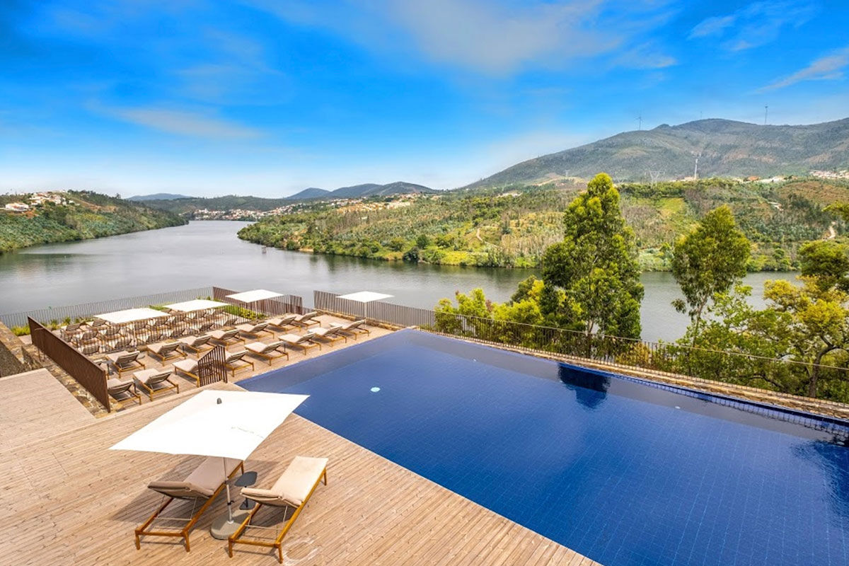 <b>Douro41 Hotel & Spa, Castelo de Paiva</b> - Set on the southern end of the Duoro River, this contemporary hotel uses its stonework, neutral palette, and minimalist décor to coerce guests into nature. With lots of light, panoramic views and an attention to detail, the Douro41 Hotel and Spa is a blank canvas for travelers to jump start their creativity and wellbeing.