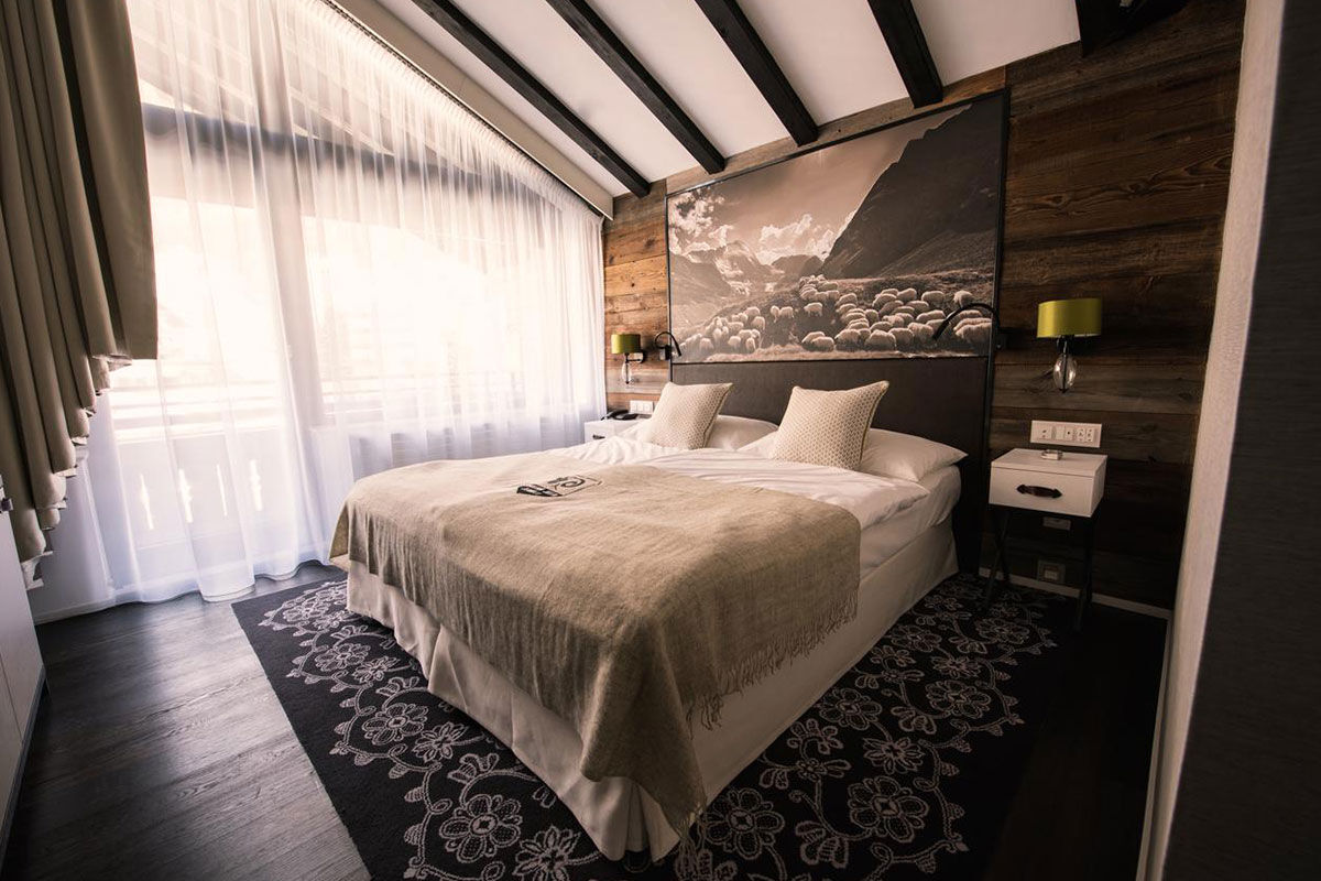 <b>Hotel Alpenhof</b> - With dark wood-beamed ceilings, rustic-chic rooms, piano bar and cigar lounge, this handsome hotel sits at ease amidst the Swiss Alps with views of Matterhorn. Family-run and only a 5-minutes’ walk to downtown Zermatt, this chalet-style hotel is the perfect, upscale cabin-like feel for your rugged mountain stay.