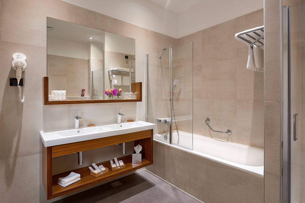 <b>Hotel Cornaro</b> - A pink palace with a rooftop terrace featuring some of the best views over Split’s Old Town, the Hotel Cornaro is both charming and polished. It features modern rooms with interesting artwork, indoor and outdoor dining, and is only a 3-minutes’ walk to UNESCO-protected Diocletian’s Palace.