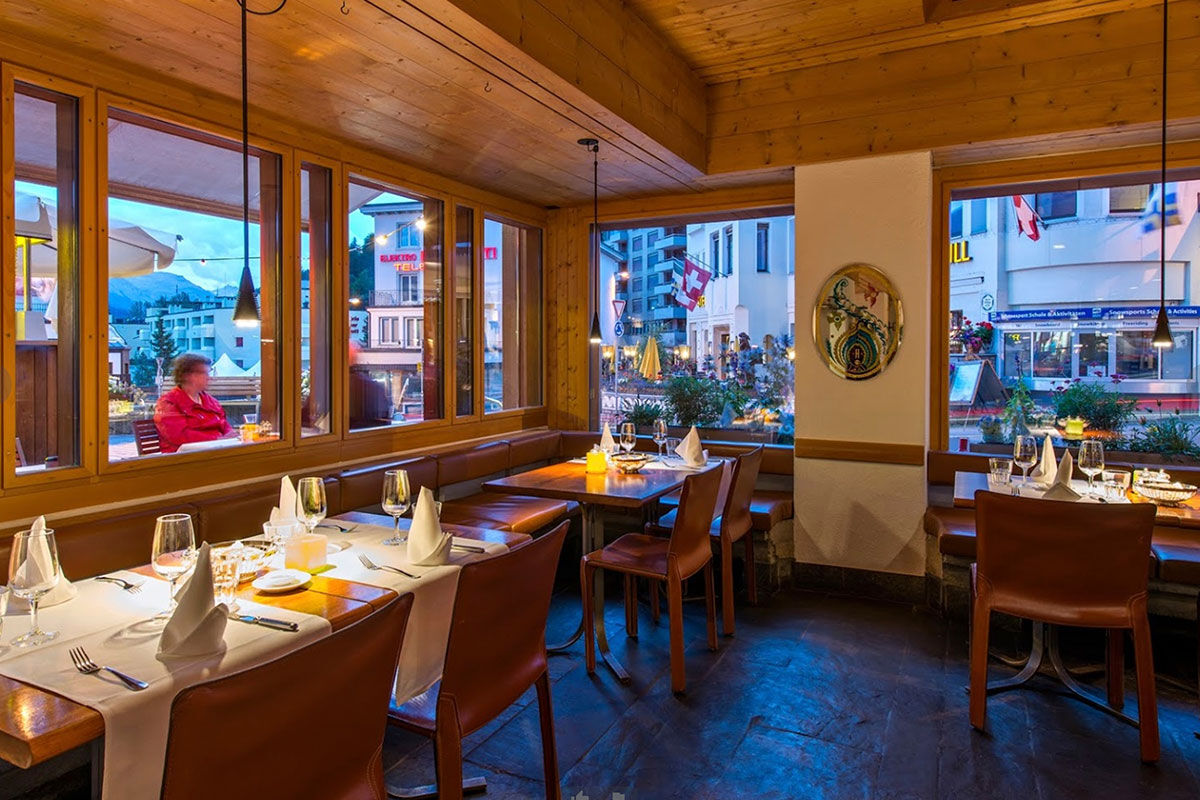 <b>Hotel Hauser</b> - Family-run since 1955, the Hotel Hauser is famous for its fine homemade confectionary and desserts. In the heart of St. Moritz, this blush-colored boutique hotel offers mountain views, contemporary and minimalist rooms, as well as a friendly restaurant and terrace bar.