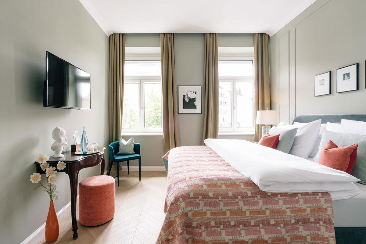 <b>Hotel Mozart</b> - Warm, with sage-colored walls throughout, the Hotel Mozart is relaxed, trendy and charming with its hardwood floors, and orb lighting. Guests enjoy the 10-minute walk into the historic Old Town to explore Salzburg and its sights.