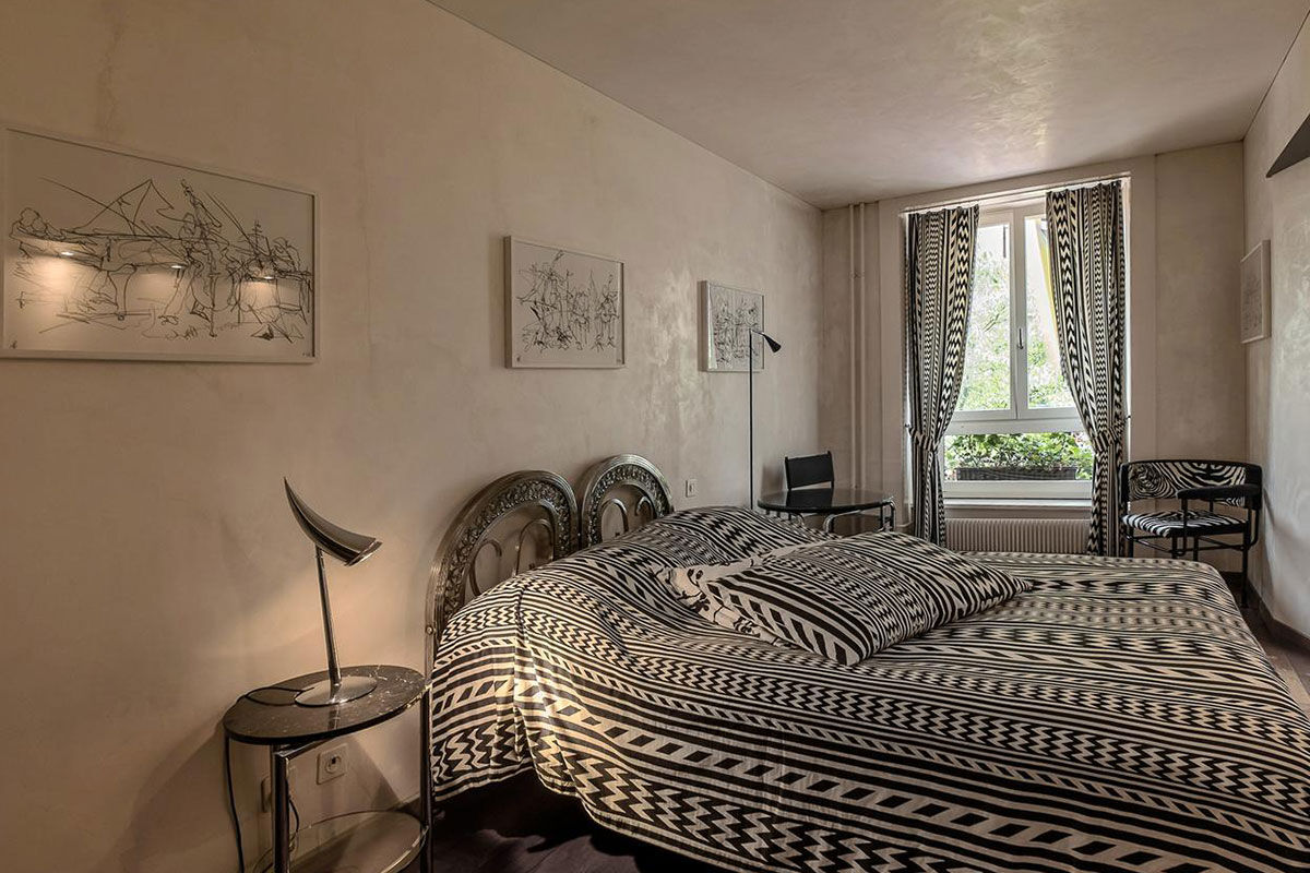 <b>Hotel Rebstock</b> - This picturesque boutique hotel sits in a historic half-timbered building with a turret and uses red-and-white stripes to draw guests’ eyes. Charming Hotel Rebstock sits at the foot of the Hofkirche Cathedral and offers 2 restaurants, a bar, seasonal terrace and informal rooms with artistic decoration.