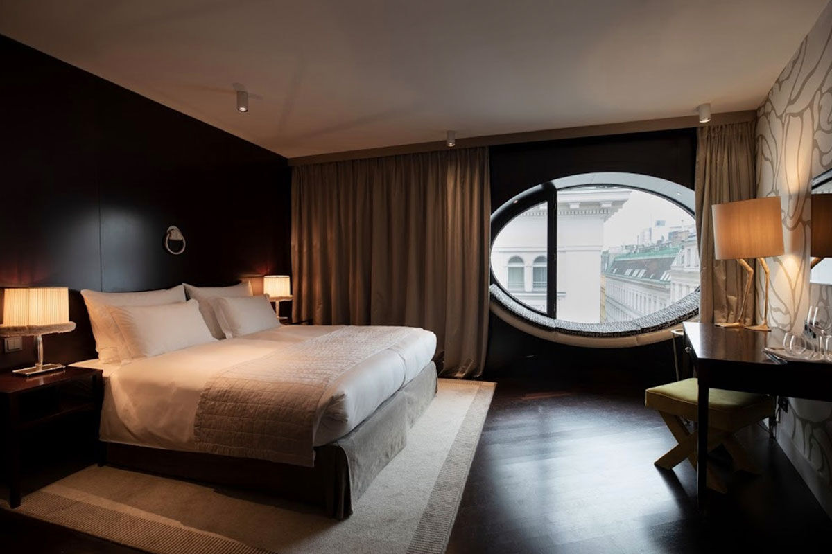 <b>Hotel Topazz</b> - With striking round windows and monochrome coloring, this eco-friendly hotel is sleek and modern. In the vibrant heart of Vienna’s 1st District, the Hotel Topazz is a 3-minute walk to St. Stephen’s Cathedral and is close to exclusive shopping streets.