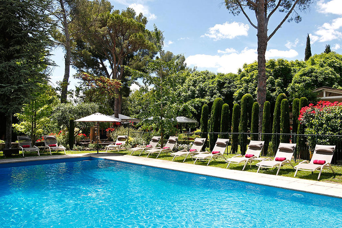 <b>Le Pigonnet, Aix en Provence</b> - Housed in an 18th century manor, this posh hotel is surrounded by landscaped gardens and terraces. Guests stay in sophisticated rooms, dine al fresco next to antique statues and grab a cocktail at the outdoor bar next to the pool.